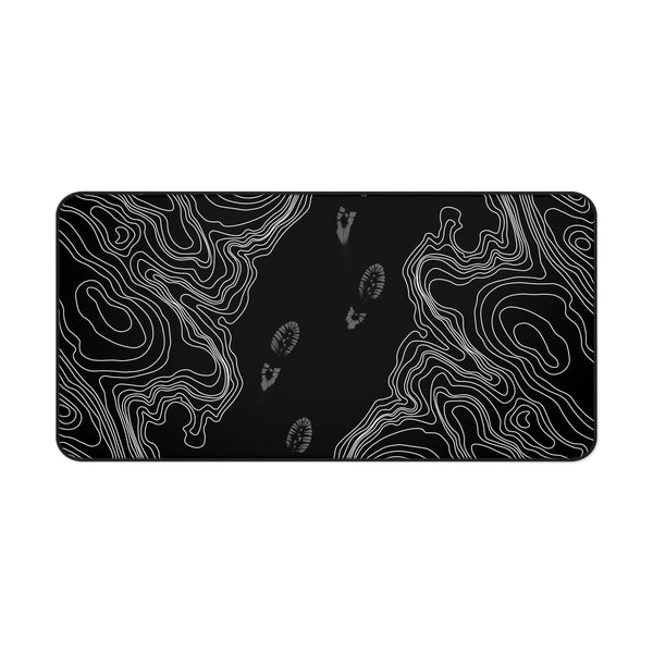 Echo Trail – Footsteps Through the Void Desk Mat