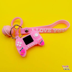 Pink Gaming Controller Peach Bell and Wrist Strap Keychain - PlayWhatever