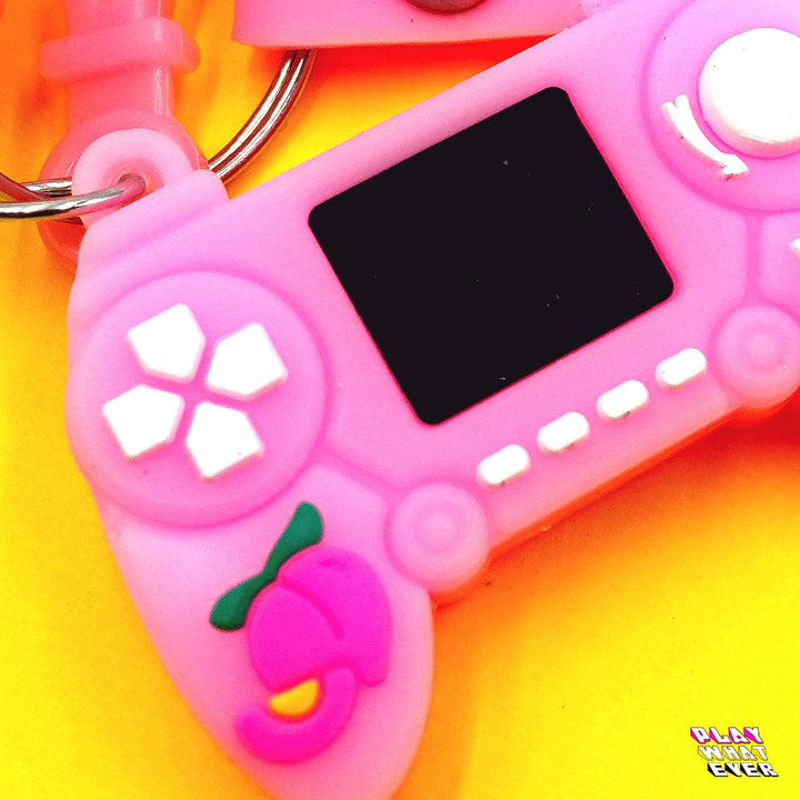 Pink Gaming Controller Peach Bell and Wrist Strap Keychain - PlayWhatever