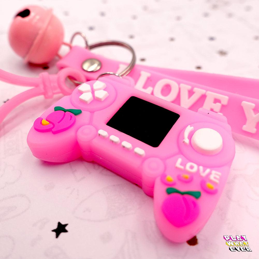Pink Gaming Controller Peach Bell and Wrist Strap Keychain - PlayWhatever